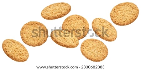 Falling oatmeal cookies isolated on white background