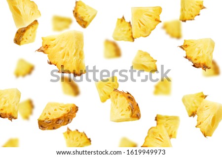 Falling pineapple slice isolated on white background, selective focus