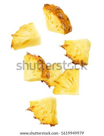 Falling pineapple slice isolated on white background, clipping path, full depth of field