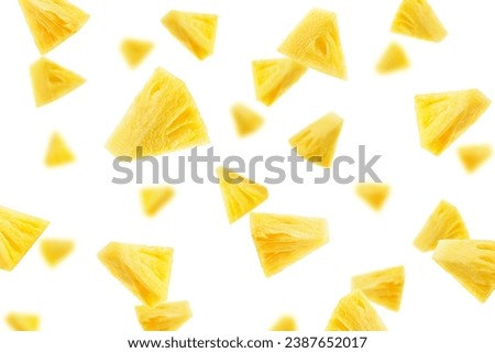 Falling Pineapple slice isolated on white background, selective focus