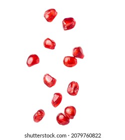 Falling Pomegranate Seeds Isolated On White Background.