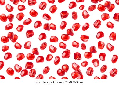 Falling Pomegranate Seeds Isolated On White Background.