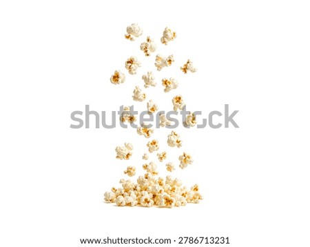 Falling pop corn isolated on white background.