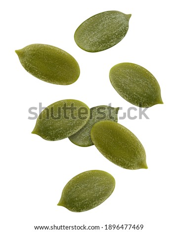 Falling Pumpkin seed, isolated on white background, clipping path, full depth of field