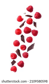 Falling Raspberries And Chocolate Chips On White Backgrounds.