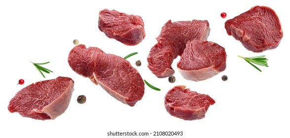 Falling raw beef meat isolated on white background - Shutterstock ID 2108020493