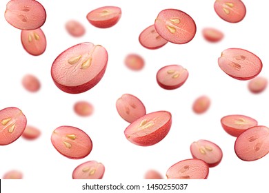Falling red grape, isolated on white background, selective focus