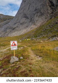 Falling Rock Warning Signs At Bunes Beach, Norway, Northern Europe.