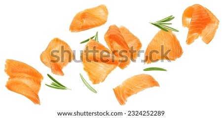 Falling salmon slices isolated isolated on white background