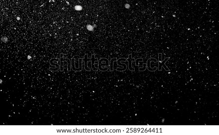 Falling Snow Effect Overlay – Isolated Snow Particles on Black Background with Winter Texture for Atmospheric and Festive Designs	