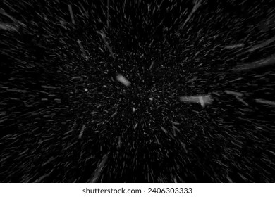 Falling snow isolated on a black background. Nature's Winter texture with the motion of real snowflakes. Beautiful natural pattern of snow. Template for design, post-production