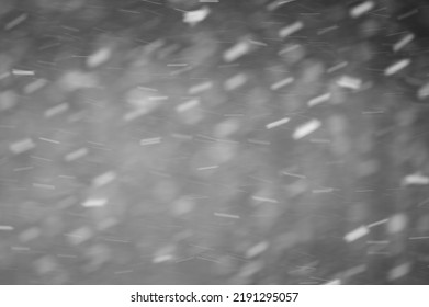 Falling Snowflakes On Day Sky Background, Isolated For Post Production And Overlay In Graphic Editor. Bokeh Of White Snow On A Gray Background.