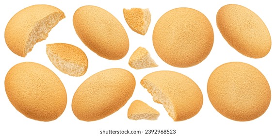 Falling sponge cakes, butter cookies isolated on white background