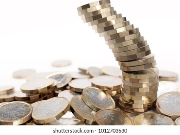 Falling stack of British one pound coins. White background.