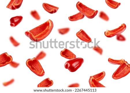 Falling sweet Pepper slice, Paprika, isolated on white background, selective focus