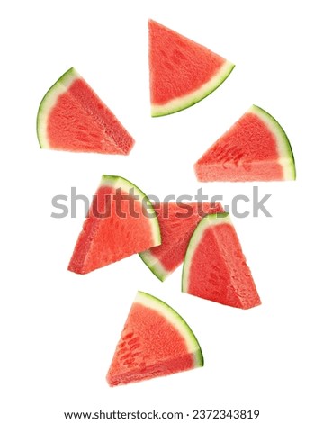 Falling Watermelon without seeds isolated on white background, full depth of field