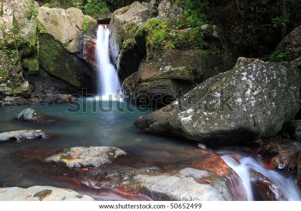 Falls and pool\
below La Mina Falls in the El Yunque rainforest in the Caribbean\
National Forest, Puerto\
Rico