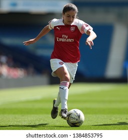 FALMER, BRIGHTON, EAST SUSSEX / UNITED KINGDOM - APRIL 28 2019: Danielle Van De Donk Dribbles The Ball In The Match Between Arsenal And Brighton And Hove Albion In The FA Women's Super League (FAWSL).