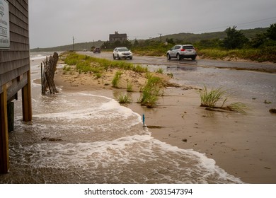 FALMOUTH, MA - AUGUST 22, 2021: Beach House On Surf Drive Is Flooded Hours Before Tropical Storm Henri Hits The Area.