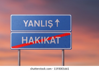 false and truth - blue road sign with inscriptions in Turkish