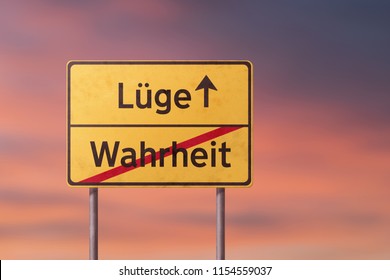false and truth - yellow traffic sign with inscriptions in German
