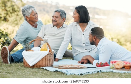 Families Are Like Branches On A Tree. Shot Of A Family Enjoying A Picnic.