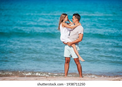 Familly Of Dad And Daughter Have Fun Together On The Beach