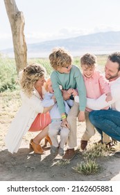 Family Of 5 With A Mom And Dad. There Are Only Boy Children, 3 Of Them. Everyone Is Happy.