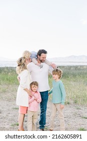 Family Of 5 With A Mom And Dad. There Are Only Boy Children, 3 Of Them. Everyone Is Happy.