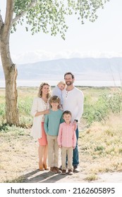 Family Of 5 With A Mom And Dad. There Are Only Boy Children, 3 Of Them. Everyone Is Happy.