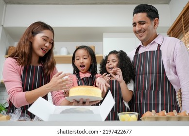 Family Activities Make A Cake In The Kitchenfamily Activities Make A Cake In The Kitchen, Child Making Cake With Family. Family Fun Together In Kitchen. Kitchen Activities Concept.