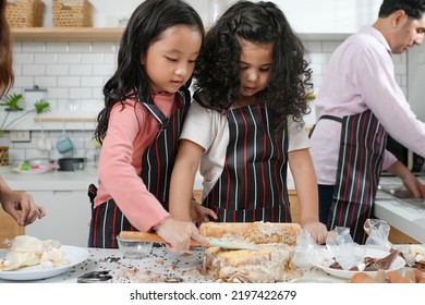 Family Activities Make A Cake In The Kitchenfamily Activities Make A Cake In The Kitchen, Child Making Cake With Family. Family Fun Together In Kitchen. Kitchen Activities Concept.