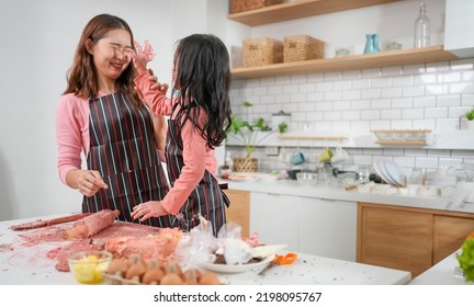 Family Activities Make A Cake In The Kitchenfamily Activities Make A Cake In The Kitchen, Child Making Cake With Family. Family Fun Together In Kitchen. Kitchen Activities Concept.