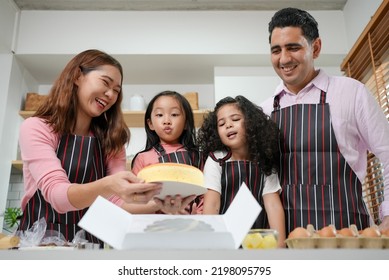 Family Activities Make A Cake In The Kitchenfamily Activities Make A Cake In The Kitchen, Child Making Cake With Family. Family Fun Together In Kitchen. Kitchen Activities Concept.