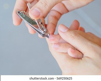 Family Activity Mother Hand Cut Nails For Kid By Using Nail Clipper