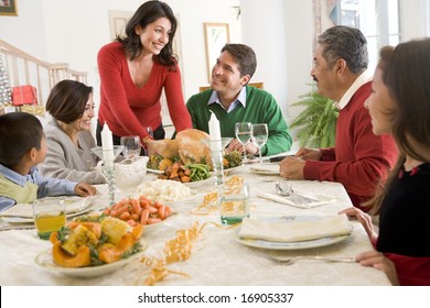 Family All Together At Christmas Dinner - Powered by Shutterstock