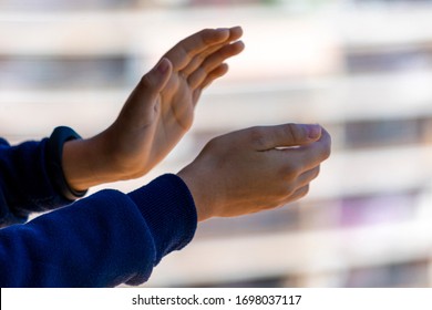 Family Applauding Medical Staff From Their Balcony. People In Spain Clapping On Balconies And Windows In Support Of Health Workers During The Coronavirus Pandemic