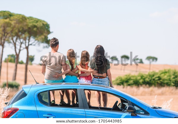 Family auto vacation in Tuscany. European\
vacation and car travel\
concept