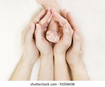 Family Baby Hands, Newborn Kid Hand Into Mother Father Parents Hands, Home Protection Concept