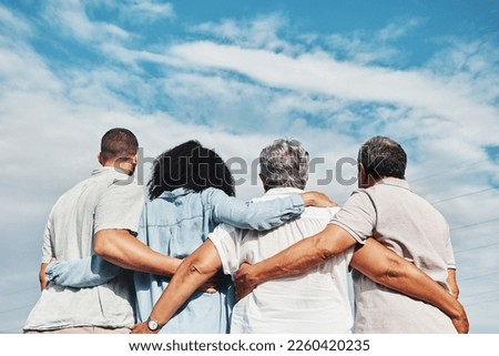 Family, back and hug with blue sky and grandparents and man together outdoor. Love, care and senior people looking at view in nature feeling happiness and joy from travel for holiday in summer