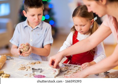 Family Baking Christmas Cookies At Home