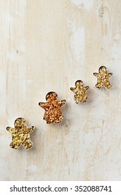 Family Baking Forms With Cereals Over Wooden Table, Above View