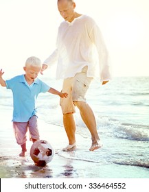 Family Beach Football Holiday Soccer Togetherness Concept