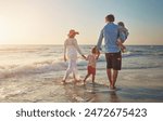 Family, beach walk and back with dad holding child for fun, relax and adventure on summer holiday. Parents, kids and travel with ocean waves, love embrace and bonding in nature with lens flare