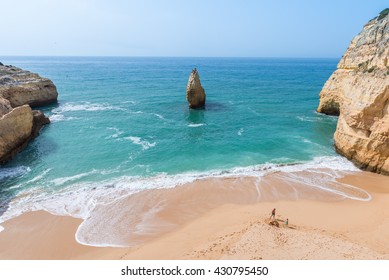 Family At Beautiful Beach Carvalho Of Algarve, Portugal