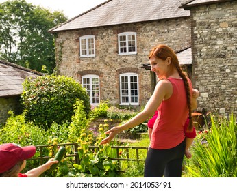 A Family In A Beautiful Holidays Cottage In Dorset, UK