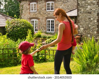 A Family In A Beautiful Holidays Cottage In Dorset, UK