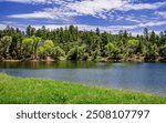 A family boating on Lynx Lake in Prescott Arizona on a warm summer day