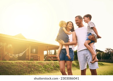 Family, bonding and new home with father, mother and kids with happiness and love. Outdoor, mockup and lens flare of a mom, dad and children together in a garden and backyard with a smile and care - Powered by Shutterstock