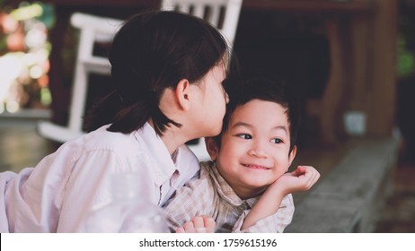 A Family Bonding.Asian Sibling  Little Boy And Girl Spent Their Time Together.Interpersonal Relationship Quality In Young Adulthood.Love And Care,family Support.Concept Of The Role Of Sibling Support.